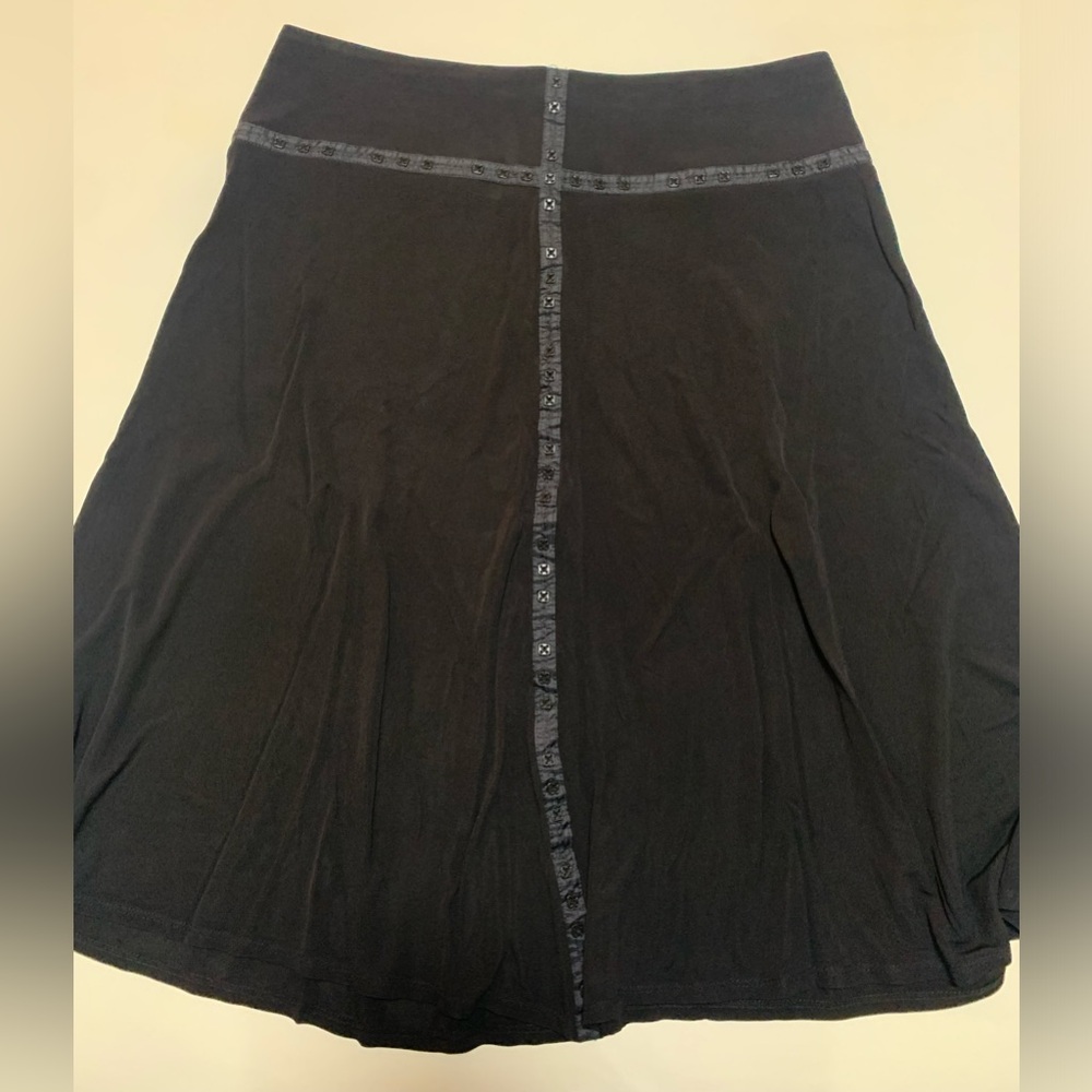 Midcalf length skirt with button detailing. 34.5” Waist 25.5” length